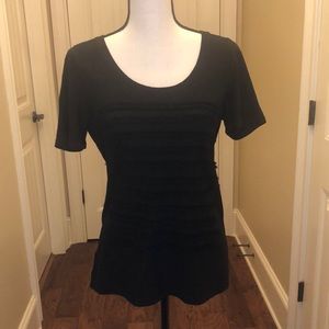 Black t shirt with frazzles on the front
